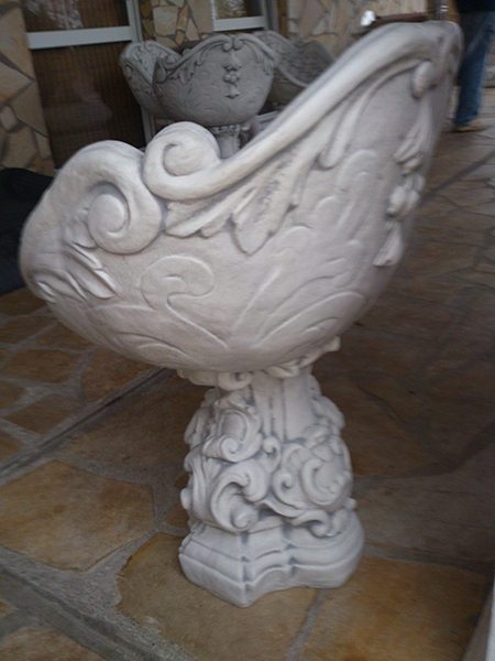massive white concrete decorative garden armchair in baroque sty