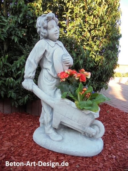 Garden Figure "Boy with a wheelbarrow" plant