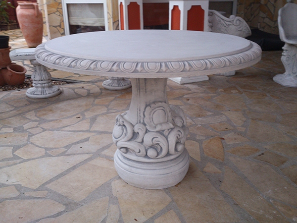Massive decorative garden table with a round shape in the Baroqu