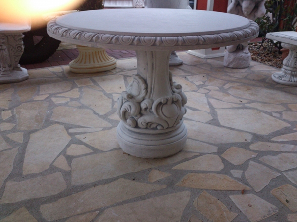 Massive decorative garden table with a round shape in the Baroqu