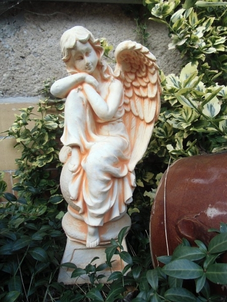 Garden figure "Angel on the ball" high 40 cm