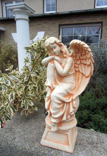 Garden figure "Angel on the ball" high 40 cm