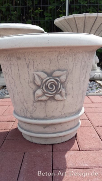 Simple round plant pot with floral decoration