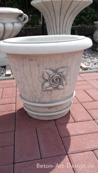 Simple round plant pot with floral decoration